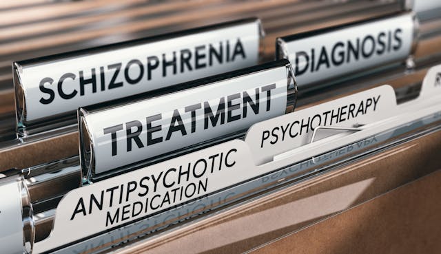 Mental health conditions, schizophrenia diagnosis and treatment with antipsychotic medication and psychotherapy. | Image Credit: Olivier Le Moal - stock.adobe.com