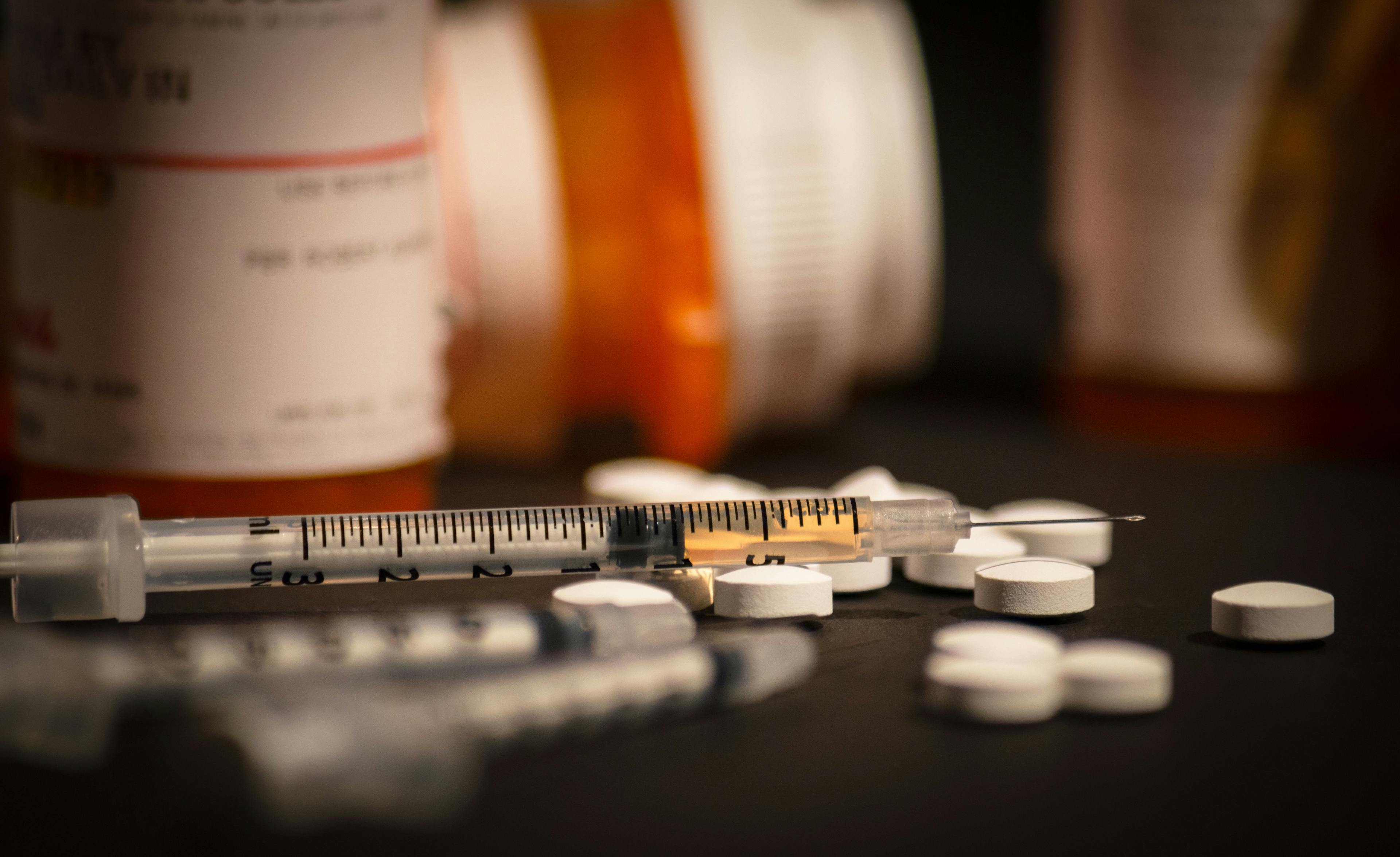 Loaded Syringe and Pills | Image credit: Darwin Brandis - stock.adobe.com
