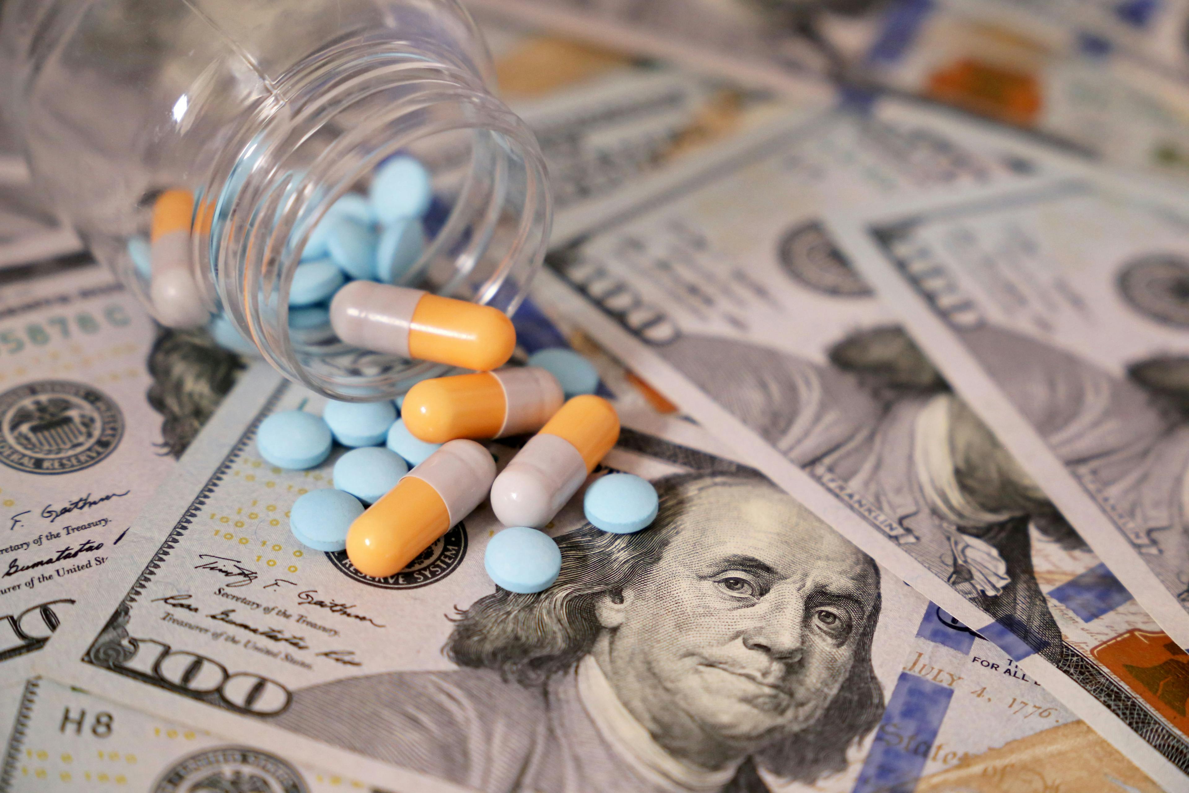 Concept of health care, pharmaceutical business, drug prices, pharmacy, medicine and economics | Image Credit: Oleg - stock.adobe.com