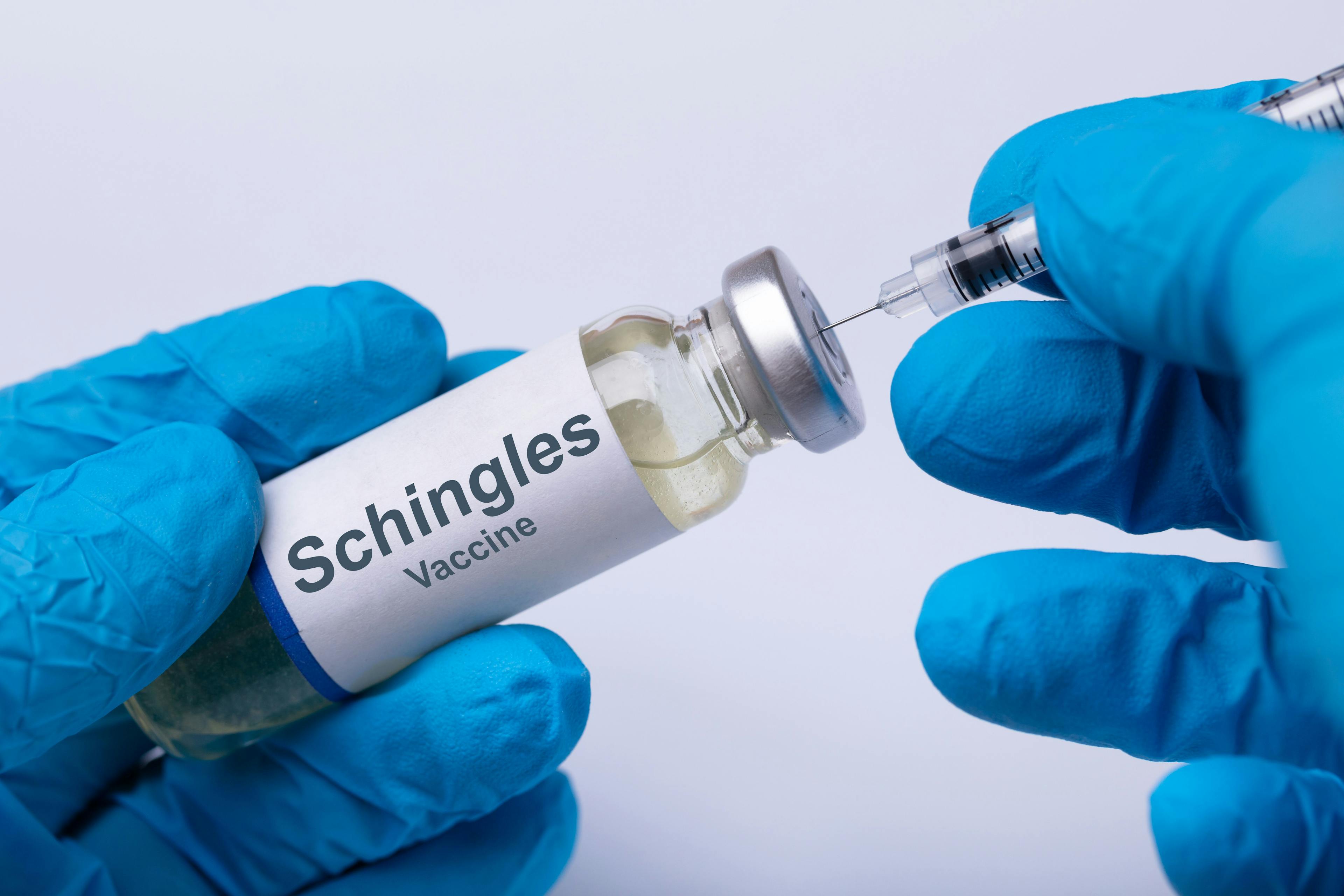 Doctor Filling Shingles Vaccine Syringe - Image credit: Andrey Popov | stock.adobe.com