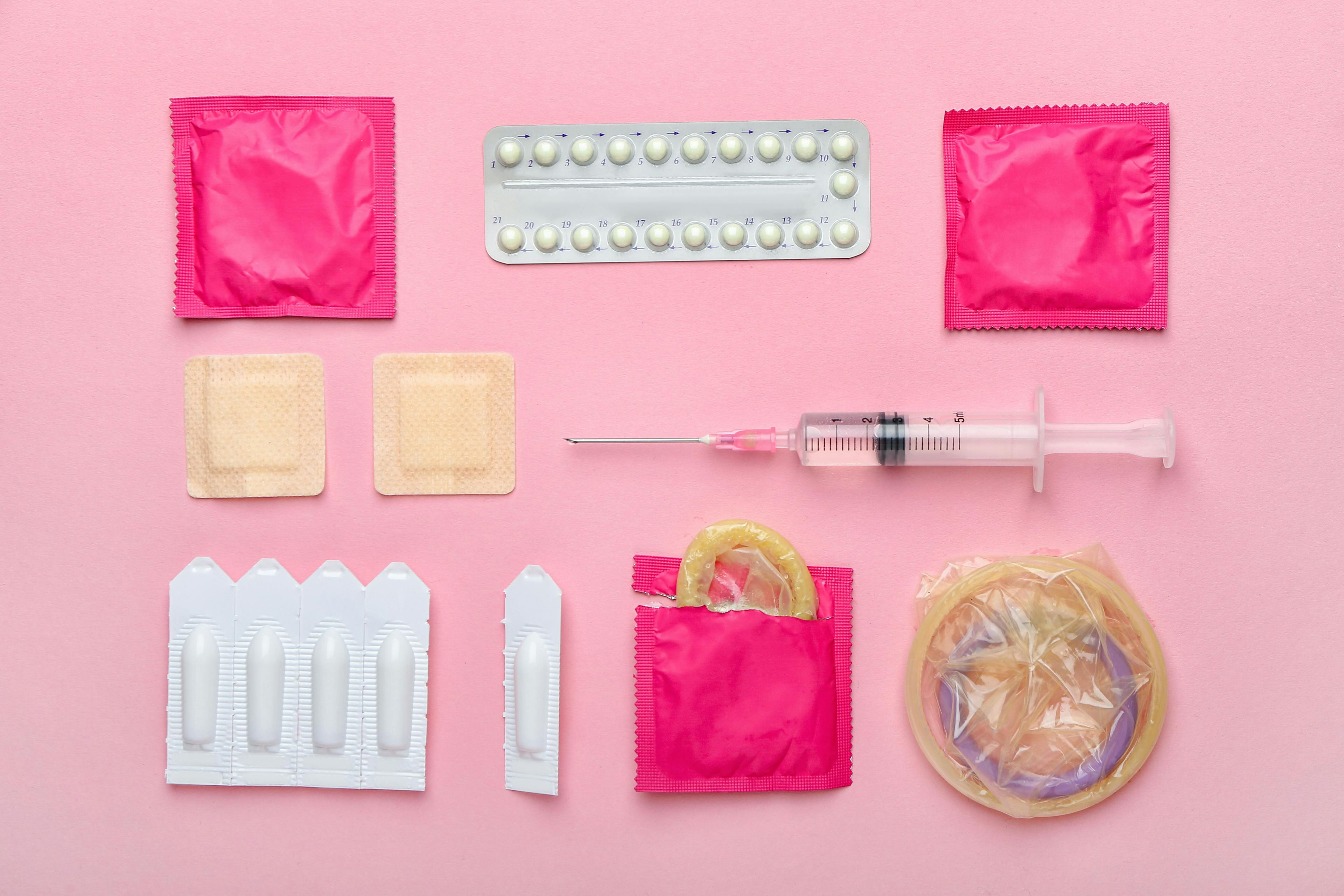 Different contraceptives on color background - Image credit: Pixel-Shot | stock.adobe.com
