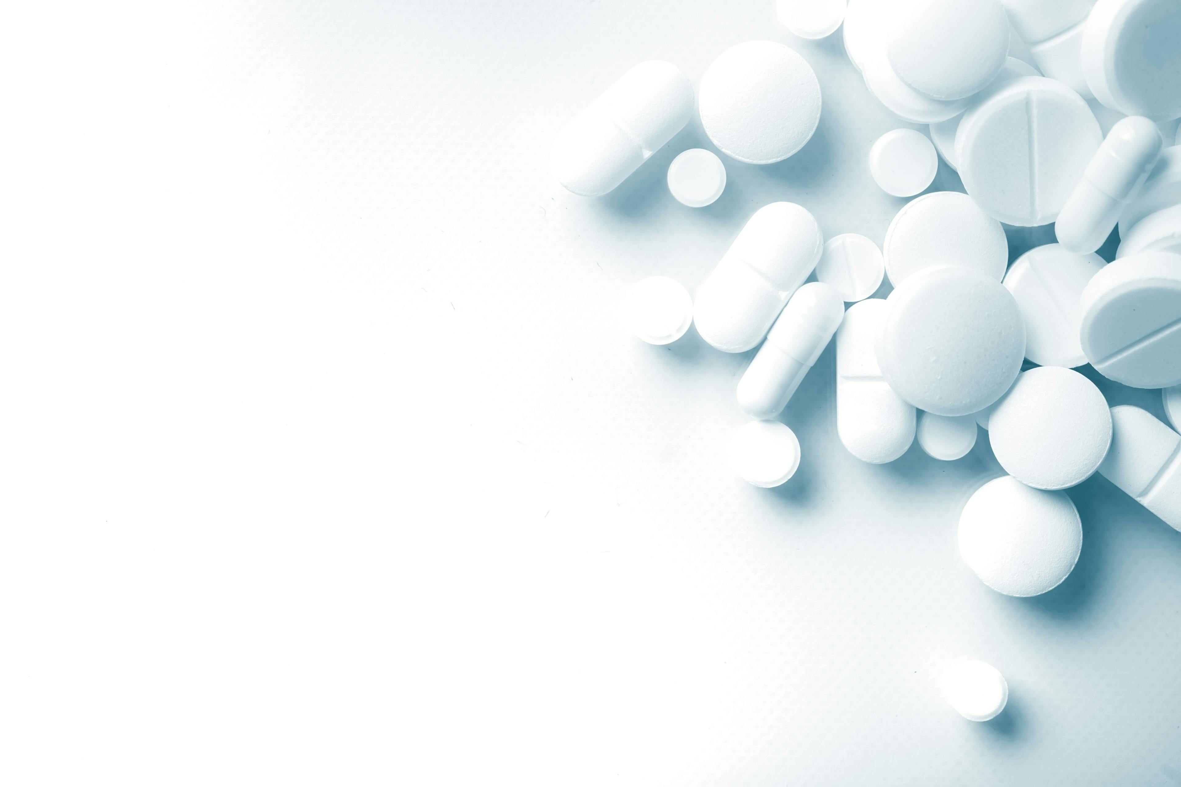 White medicine tablets antibiotic pills; pharmacy, biopharmacy | Image Credit:  zadorozhna - stock.adobe.com