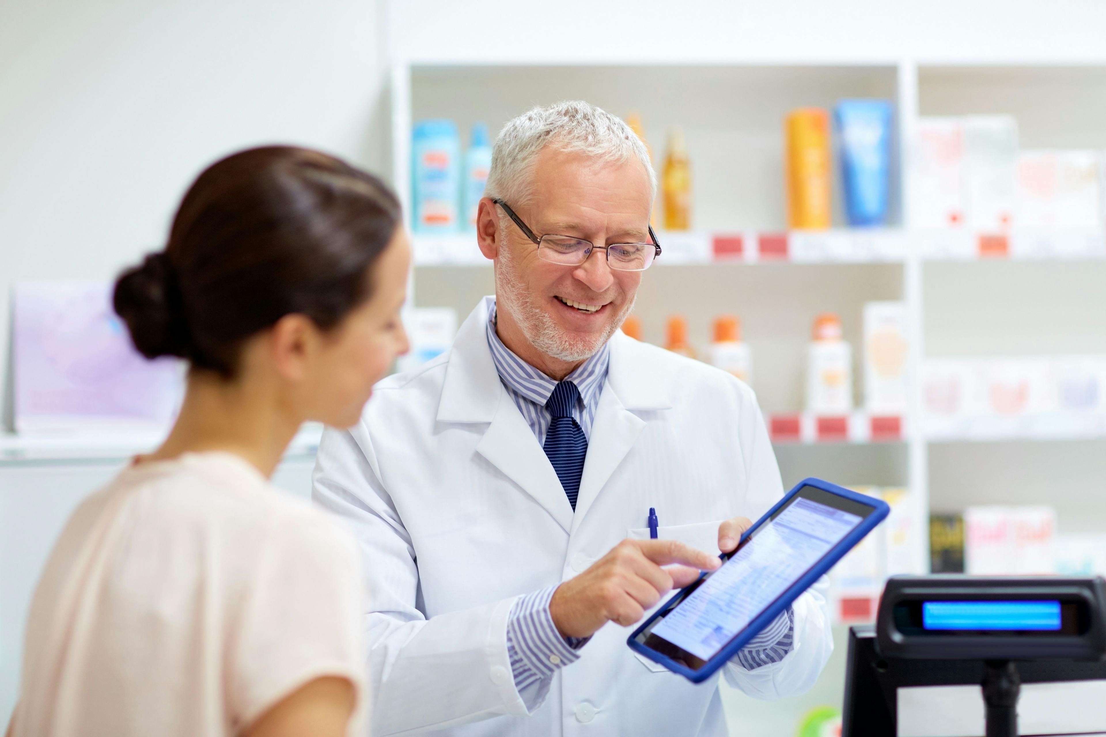 customer with tablet pc at pharmacy | Image Credit: Syda Productions - stock.adobe.com