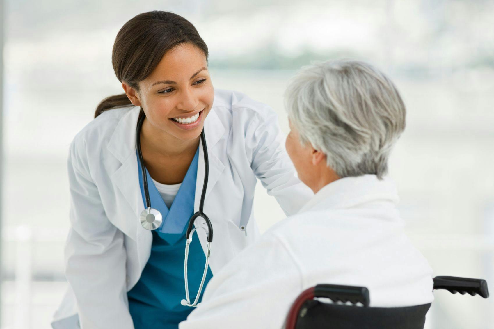 Physician talking to patient