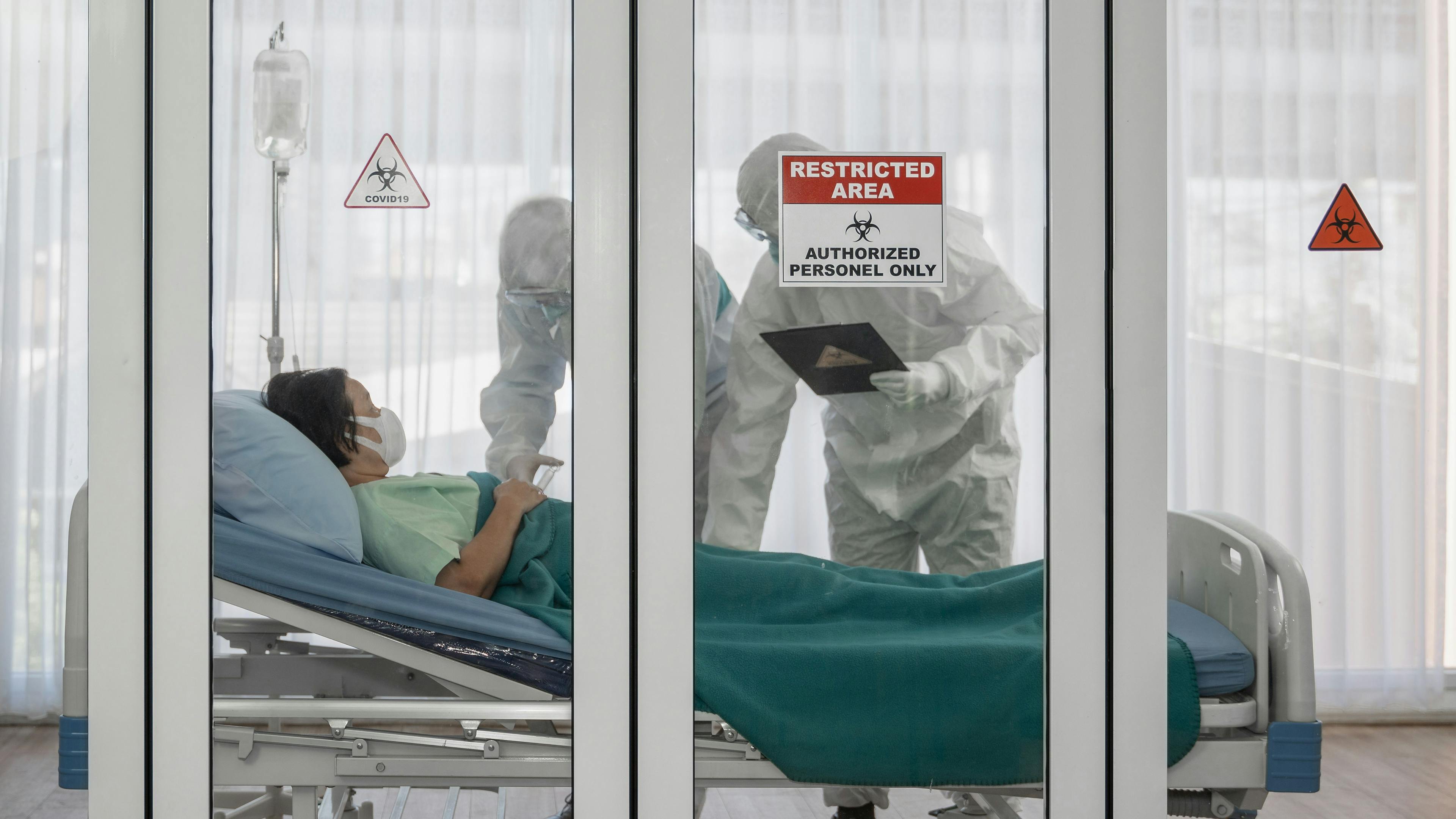 Coronavirus covid 19 infected patient in quarantine room with quarantine and outbreak alert sign at hospital with disease control experts make disease -  Image credit: Mongkolchon | stock.adobe.com 