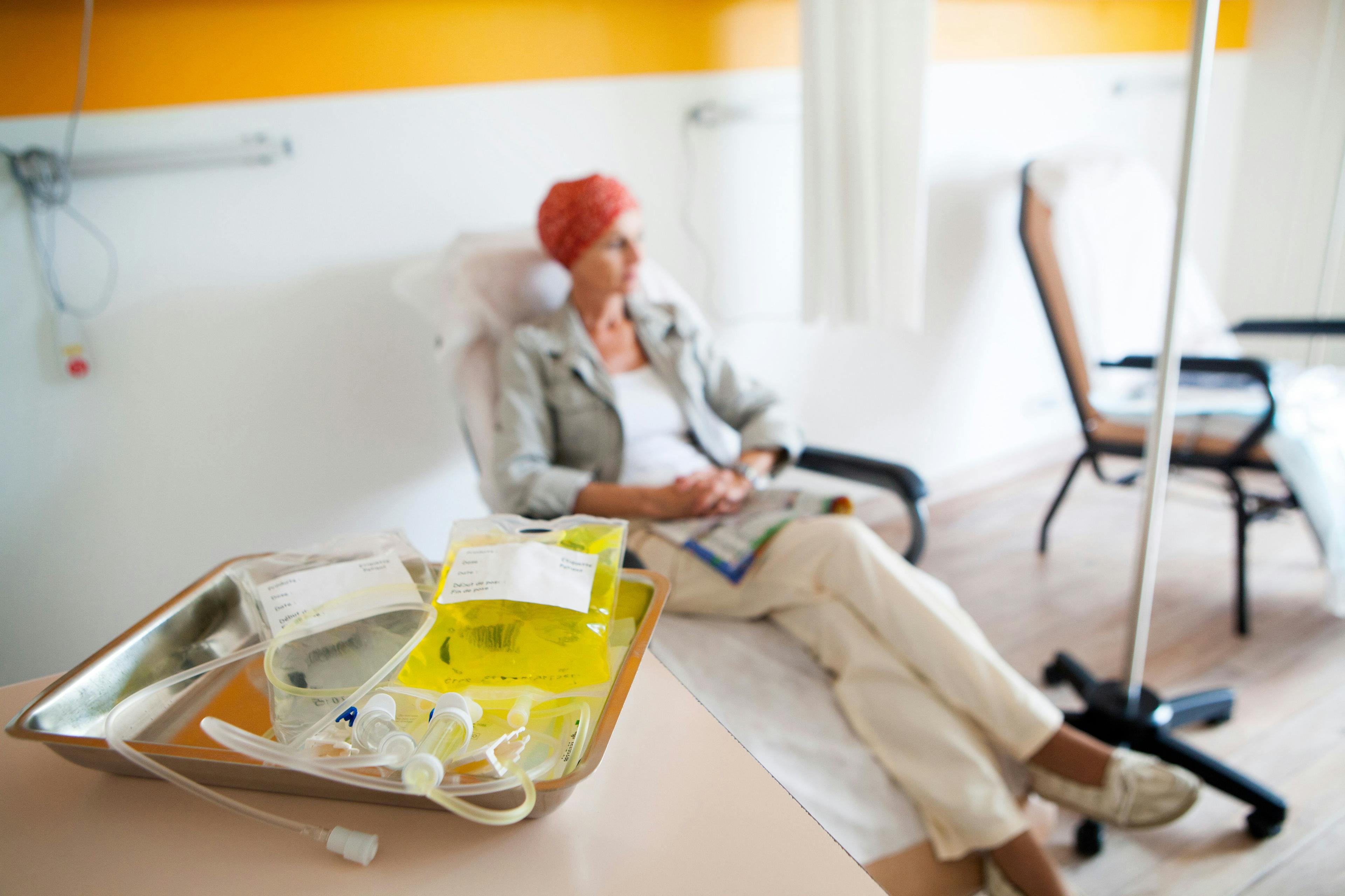 Woman receiving chemotherapy treatment