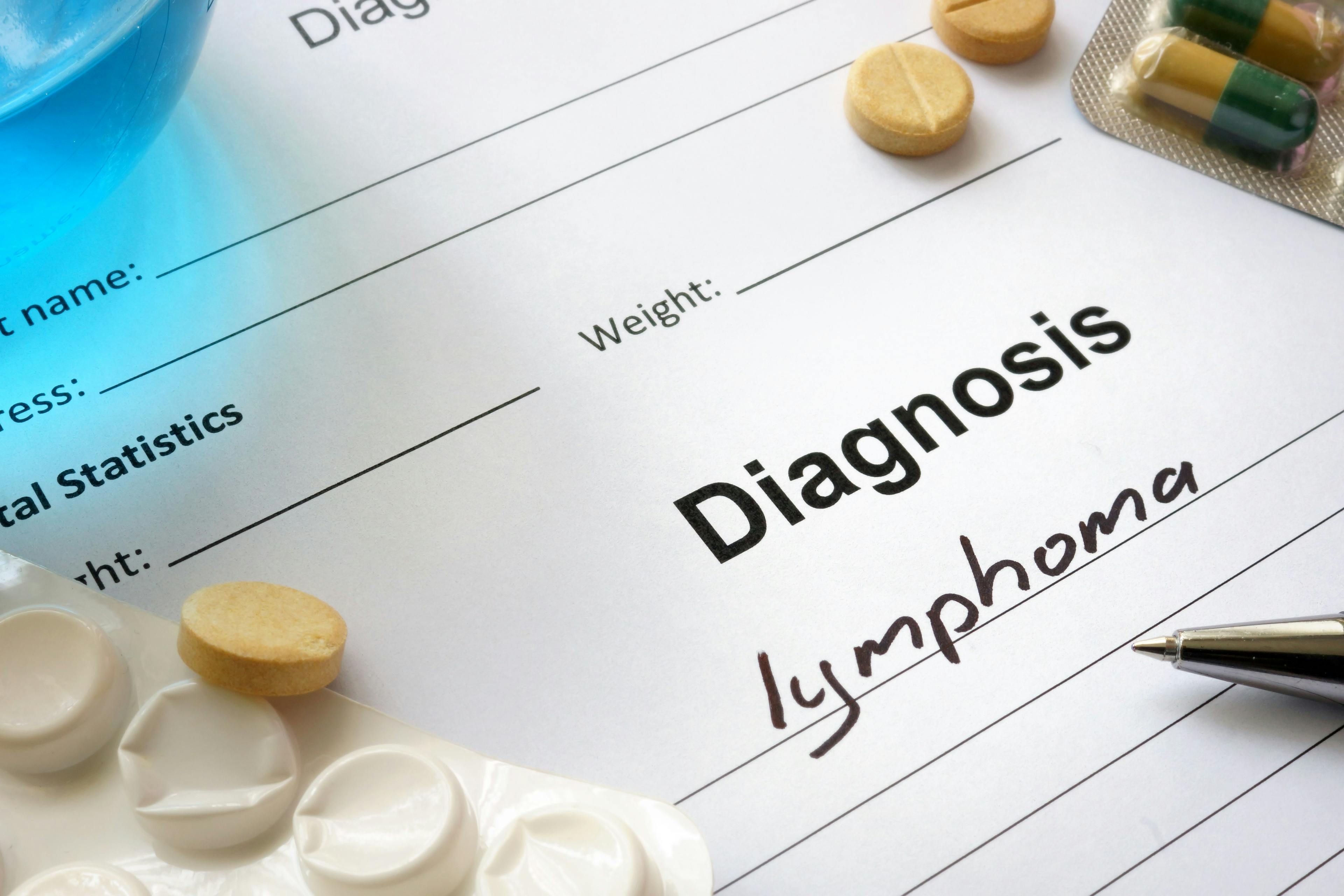 Diagnosis lymphoma written in the diagnostic form and pills. Credit: Vitalii Vodolazskyi - stock.adobe.com