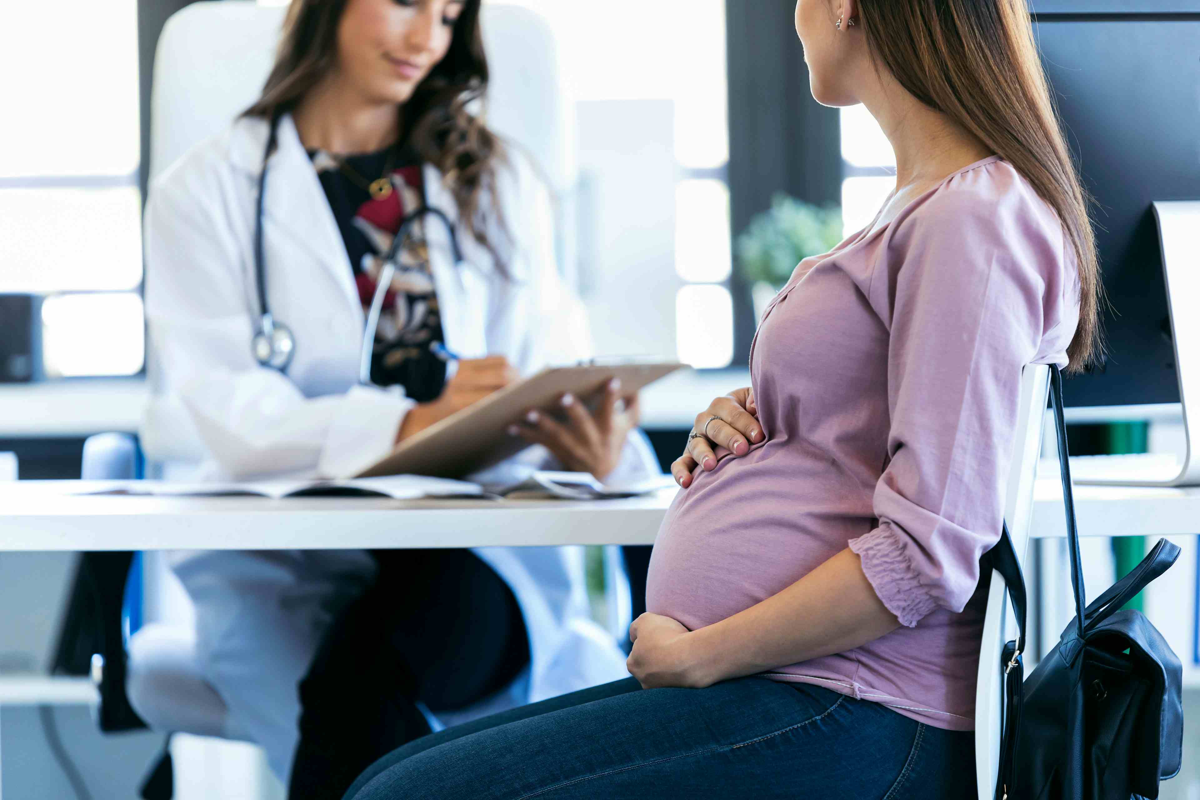 Pregnant patient receiving consultation