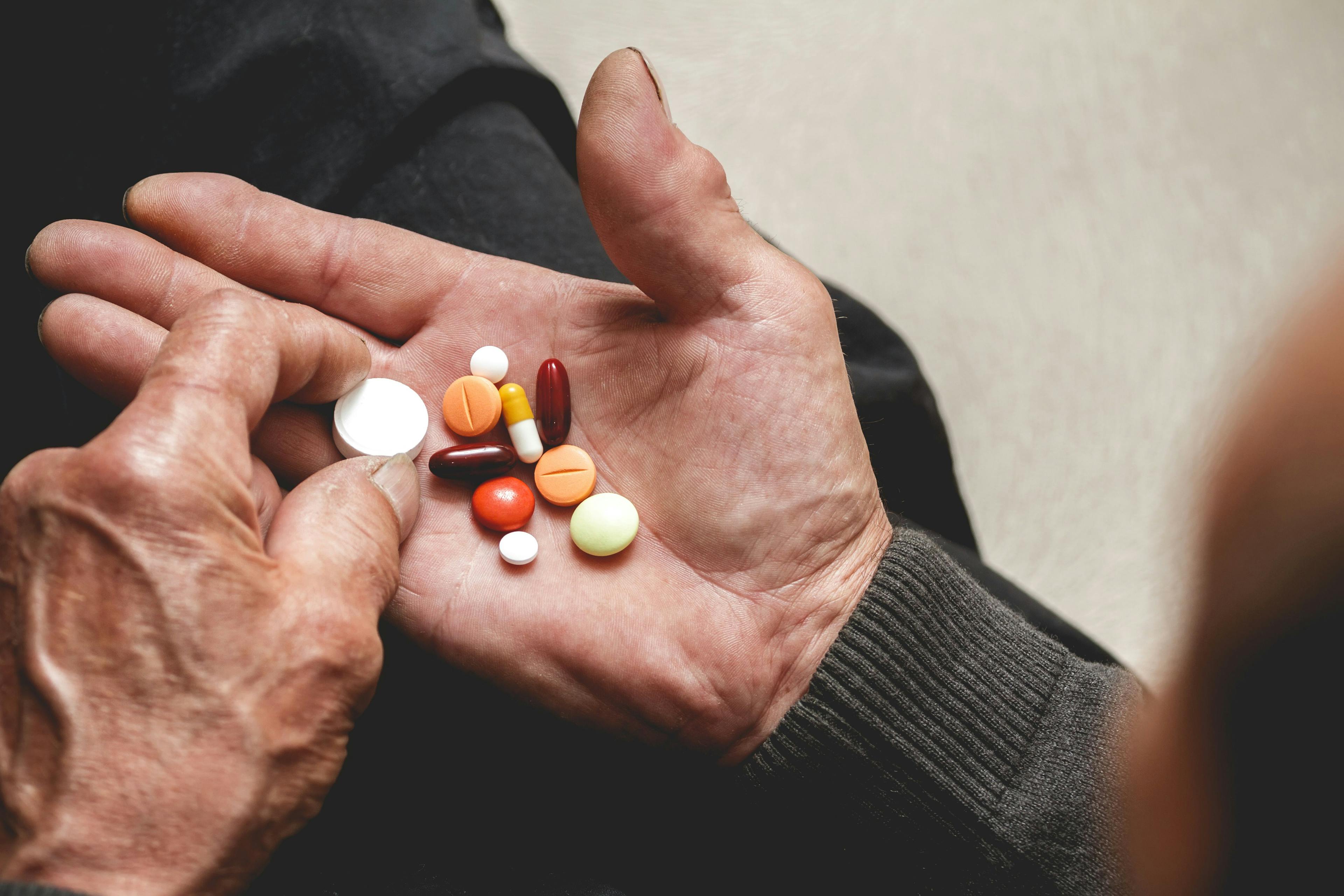 Elderly person holding medication | perfectlab | stock.adobe.com