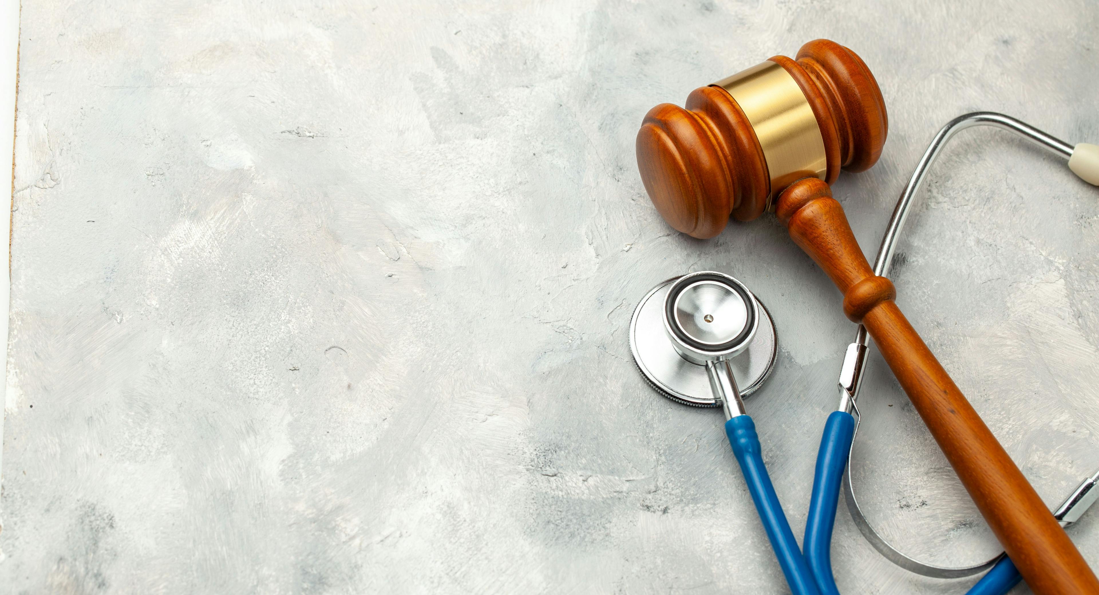 Judge gavel and stethoscope. The law in medicine, the sentence on medical negligence | Image credit: Adragan - stock.adobe.com