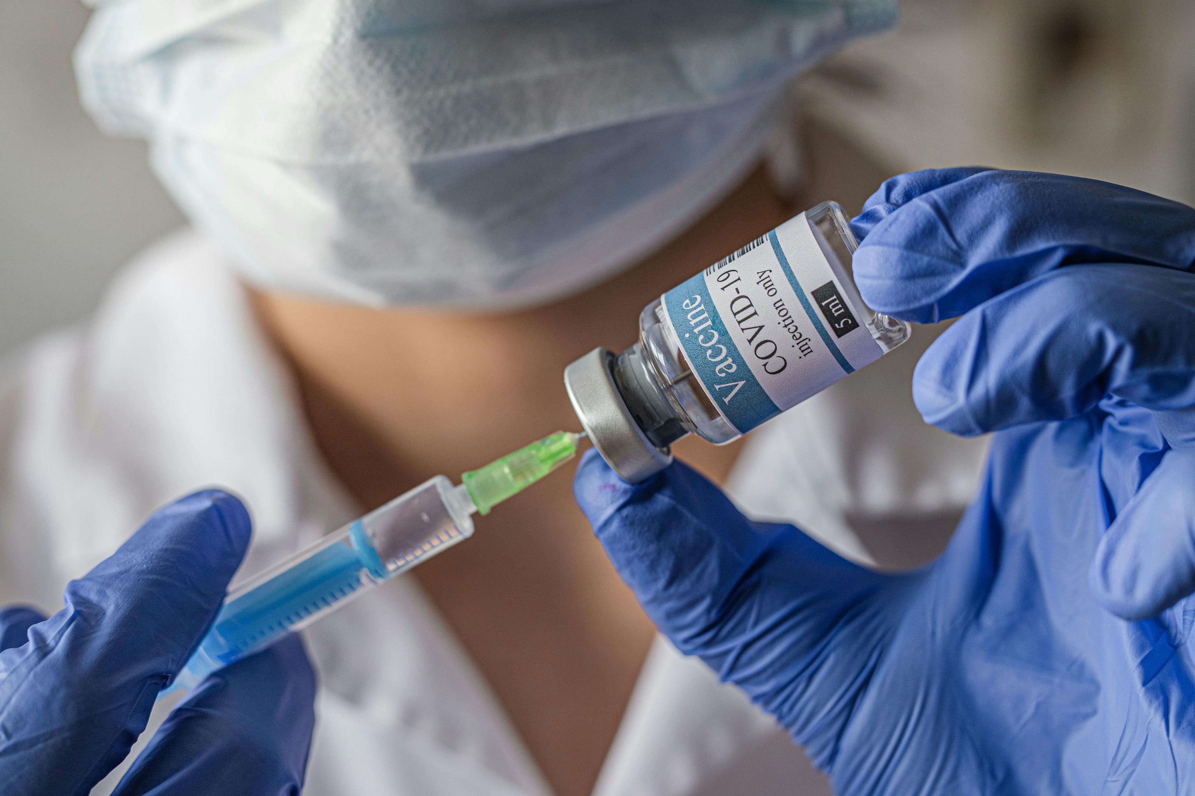 vial, covid-19, coronavirus vaccine ampoule, bottle for injection with syringe. Credit: myskin - stock.adobe.com
