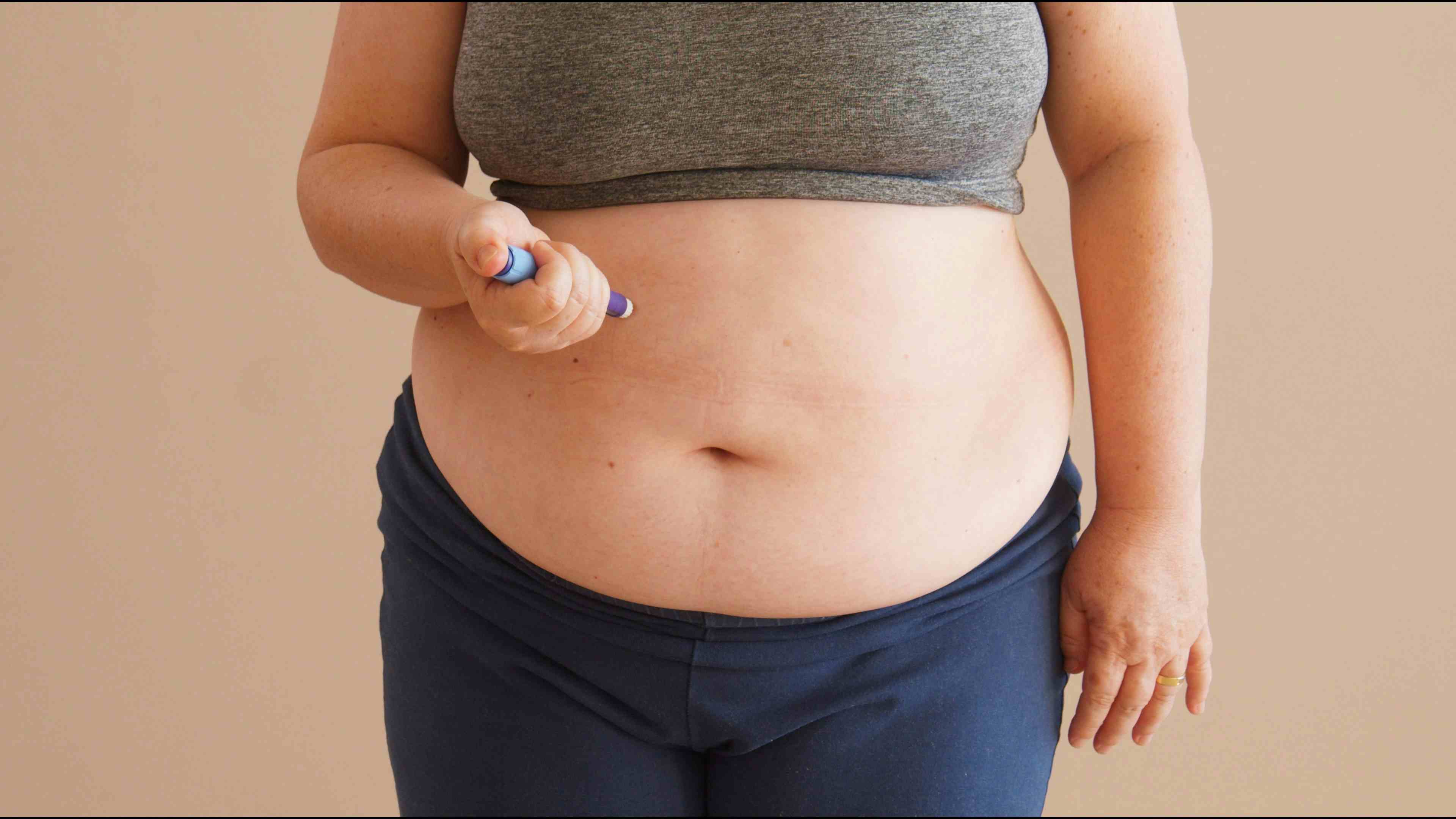 Women applying weight loss medication | Image credit: Mauricio - stock.adobe.com 