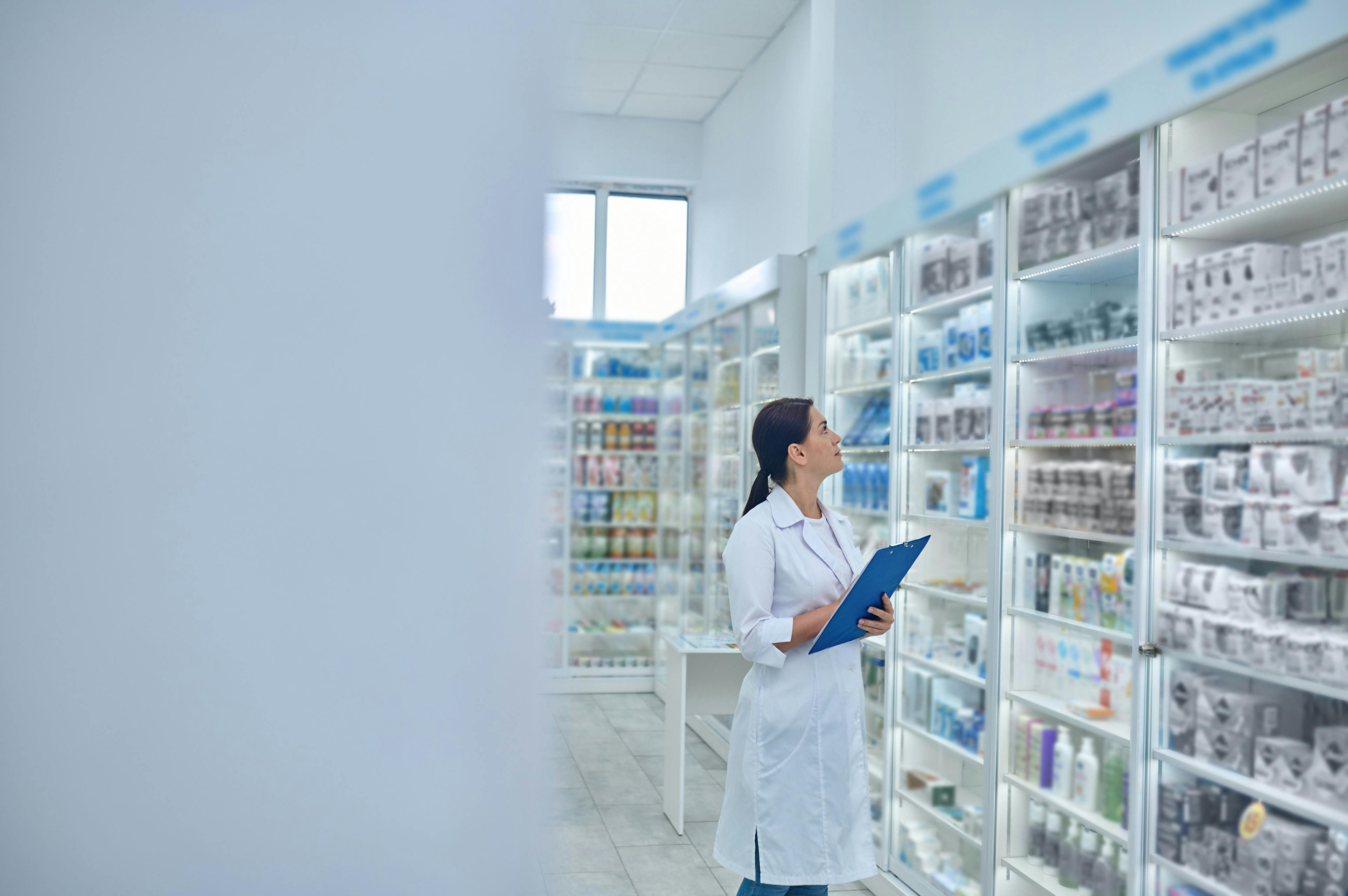 Pharmacist checking medicines in a drugstore - Image credit: Zinkevych | stock.adobe.com 