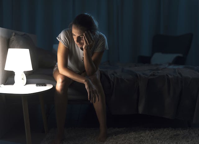 Exhausted woman suffering from insomnia - Image credit: stokkete | stock.adobe.com