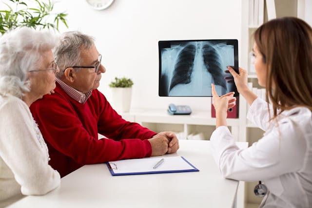 Doctor shows results to old patient x-ray of the lungs - Image credit: didesign | stock.adobe.com