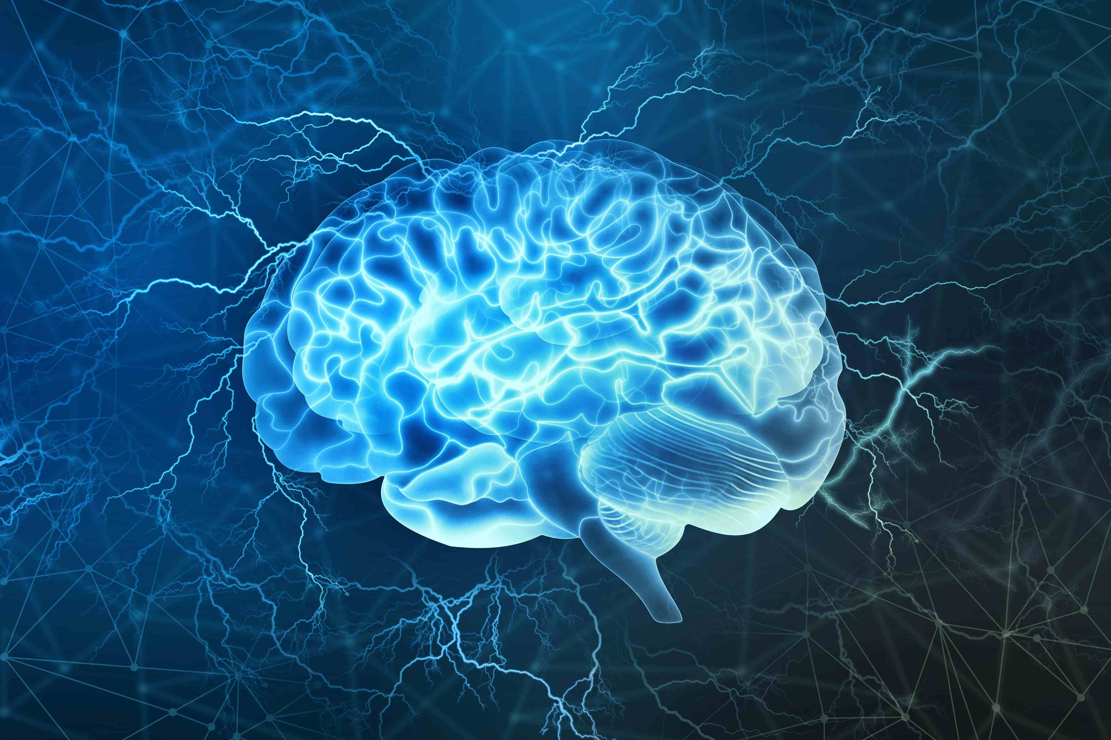 Human brain digital illustration. Electrical activity, flashes, and lightning on a blue background. | Image Credit: Siarhei - stock.adobe.com