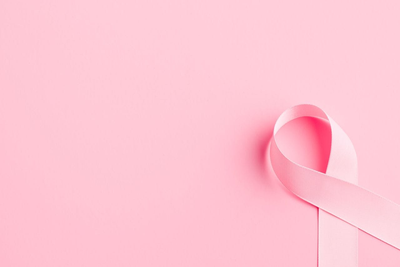 Pink ribbon for breast cancer on a pink background | Image credit: Jiri Hera - stock.adobe.com