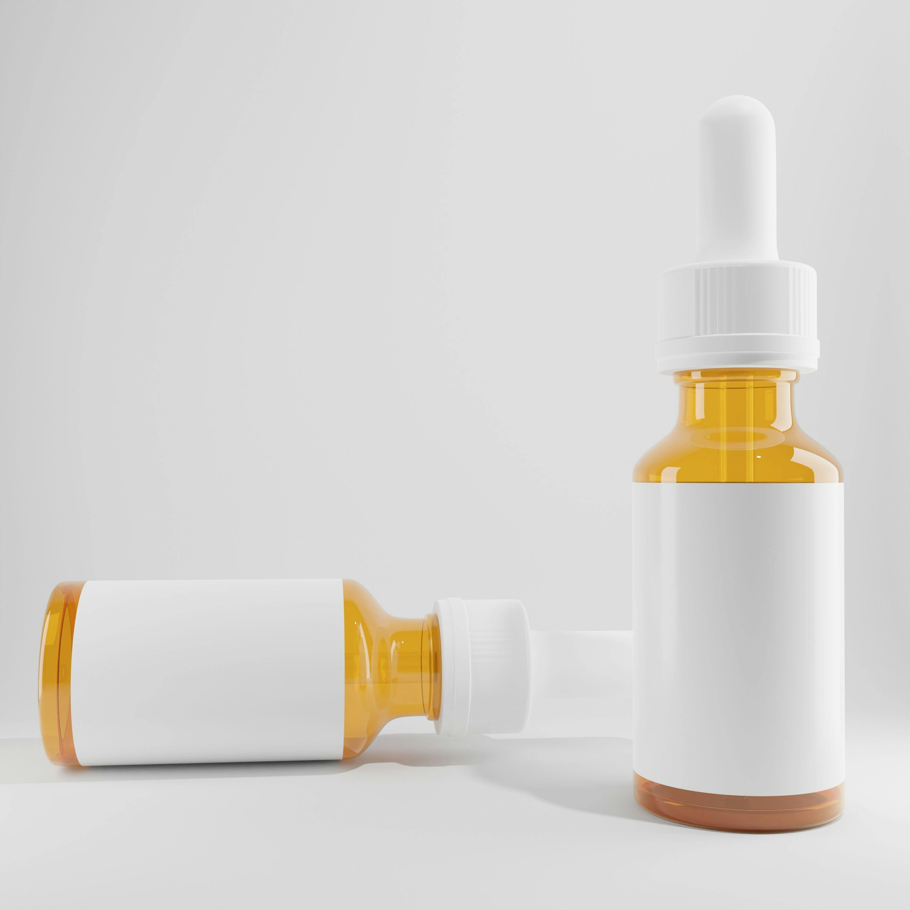 two glass cosmetic bottles dropper with a blank label and white lid a front view 3d render  | Image credit: Josephait - stock.adobe.com