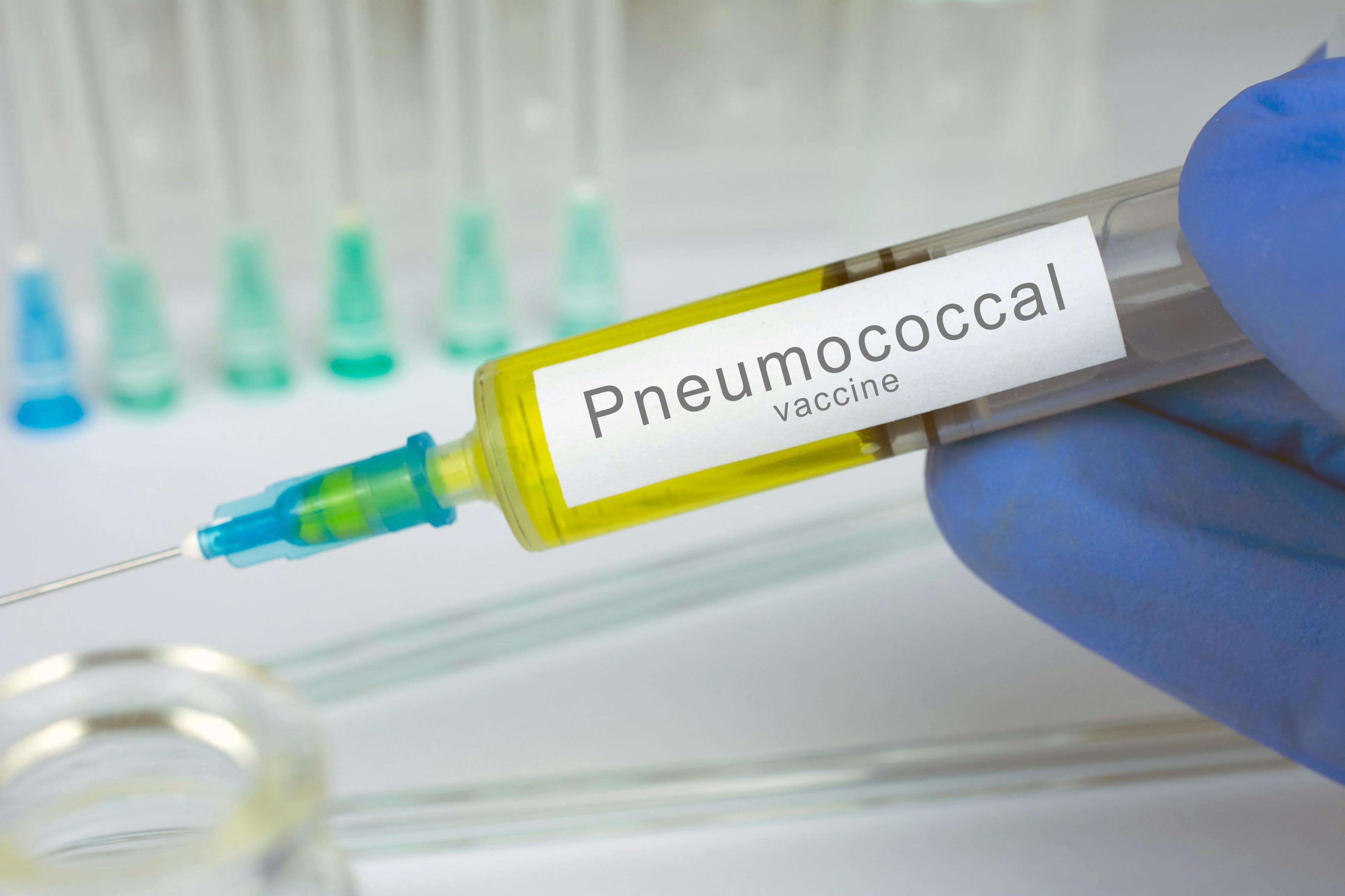 ands of doctor or nurse in medical gloves with medical syringe ready for injection a shot of Pneumococcal vaccine | Image Credit: SecondSide - stock.adobe.com