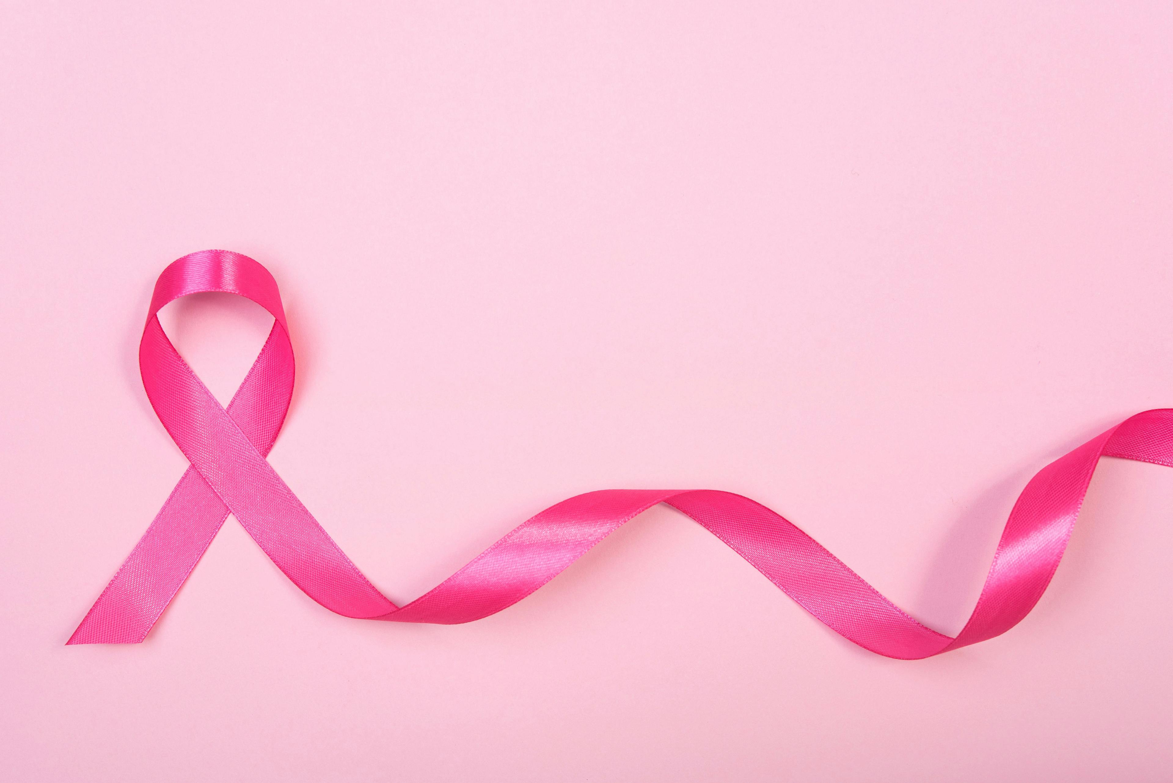 pink ribbon breast cancer on pink background. | Image Credit: NaMong Productions - stock.adobe.com