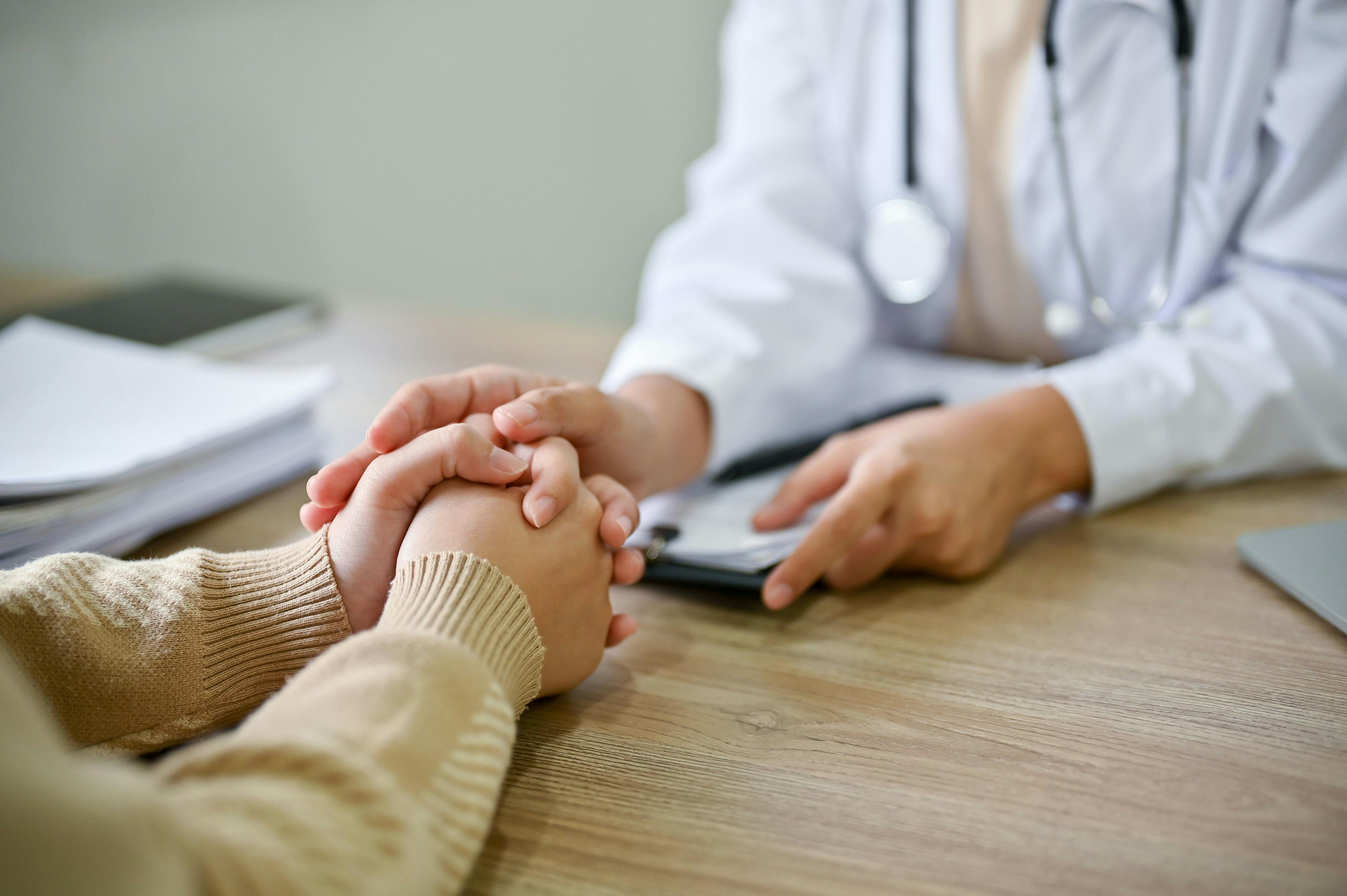 Close up view of doctor touching patient hand, showing empty and kindness- Image credit: Bongkarn | stock.adobe.com