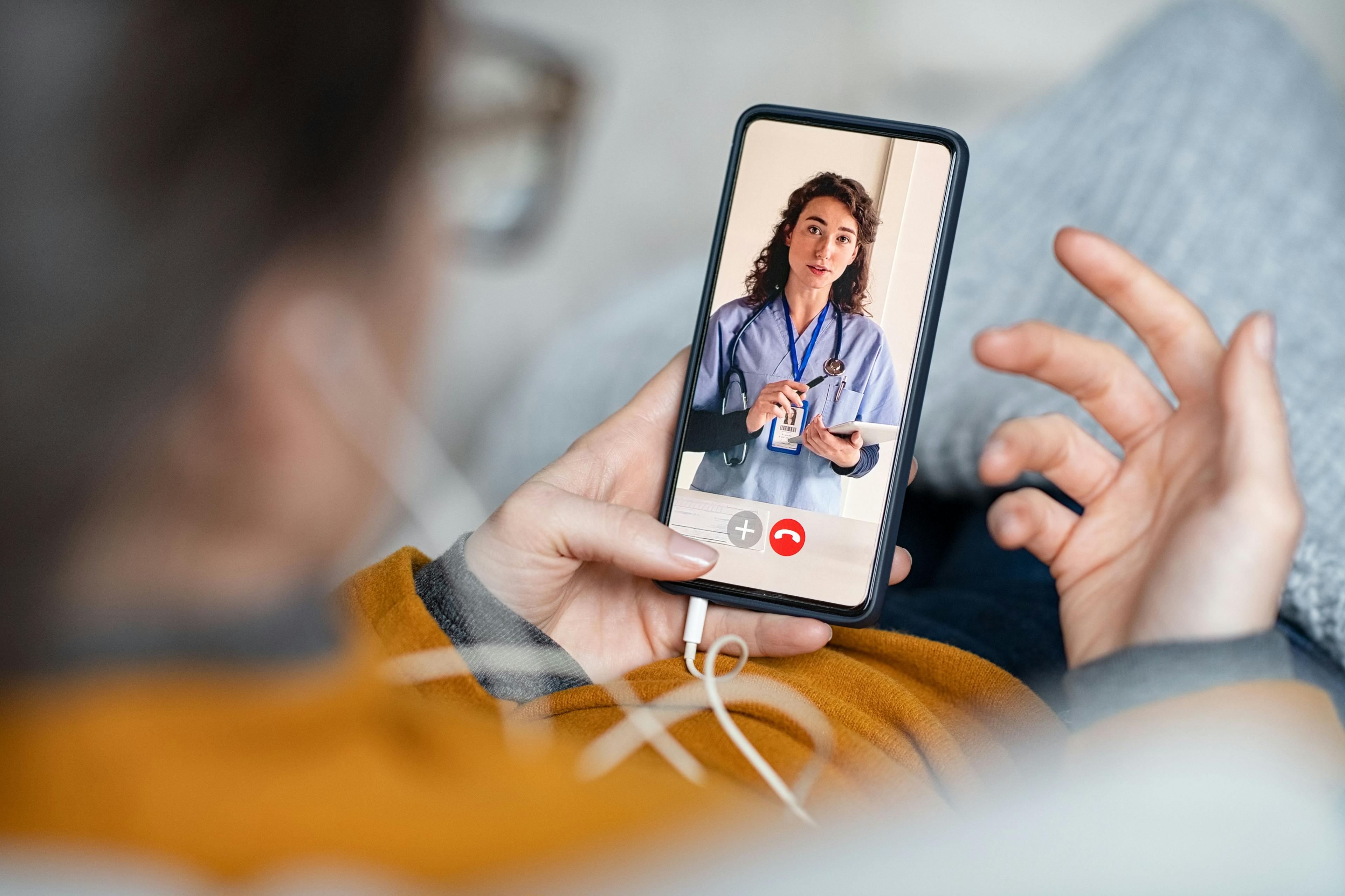 Woman doing video call with doctor. Credit: Rido - stock.adobe.com