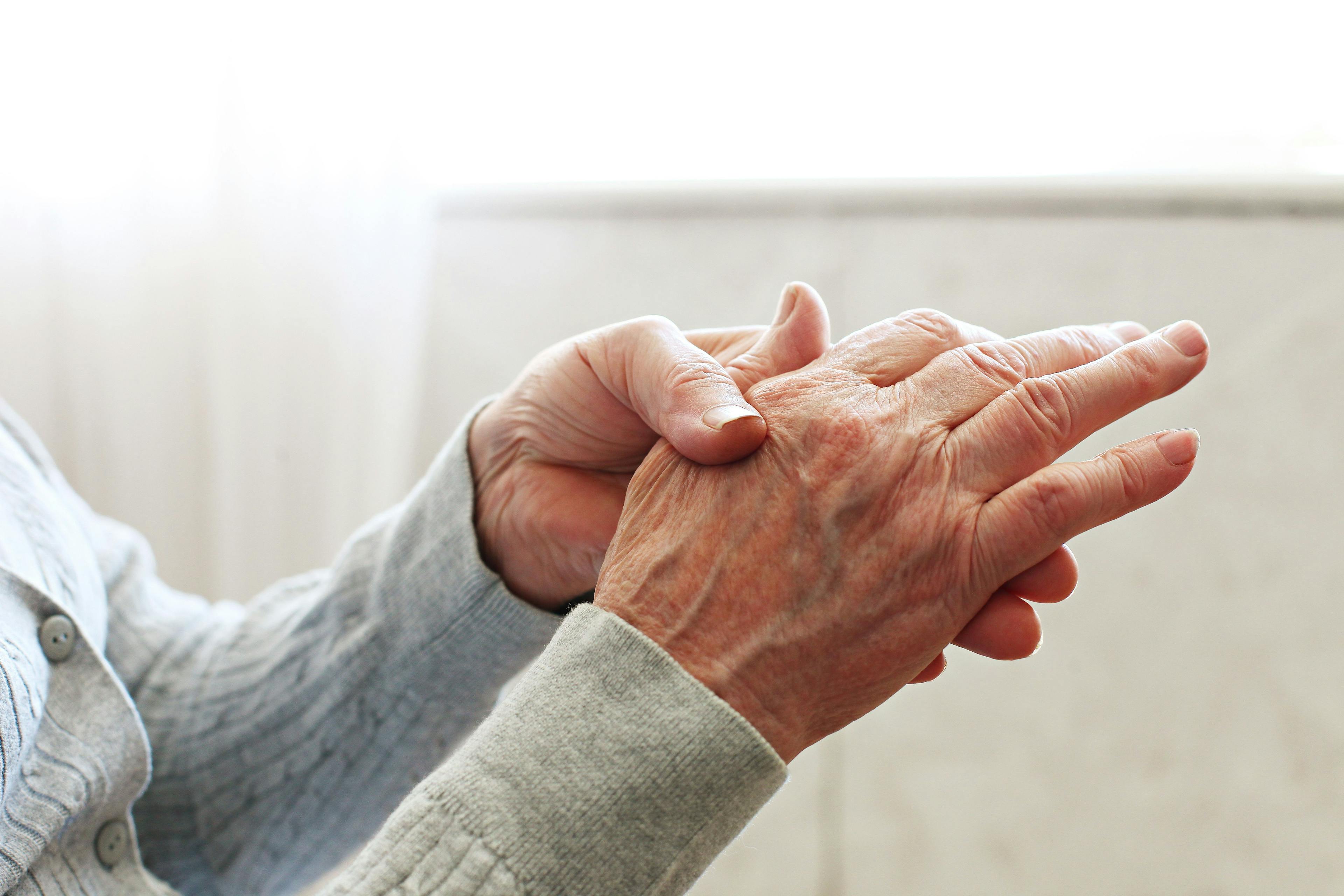 Senior old lady experiencing severe arthritis rheumatics pains, massaging, warming up arm. | Image Credit: Evrymmnt - stock.adobe.com