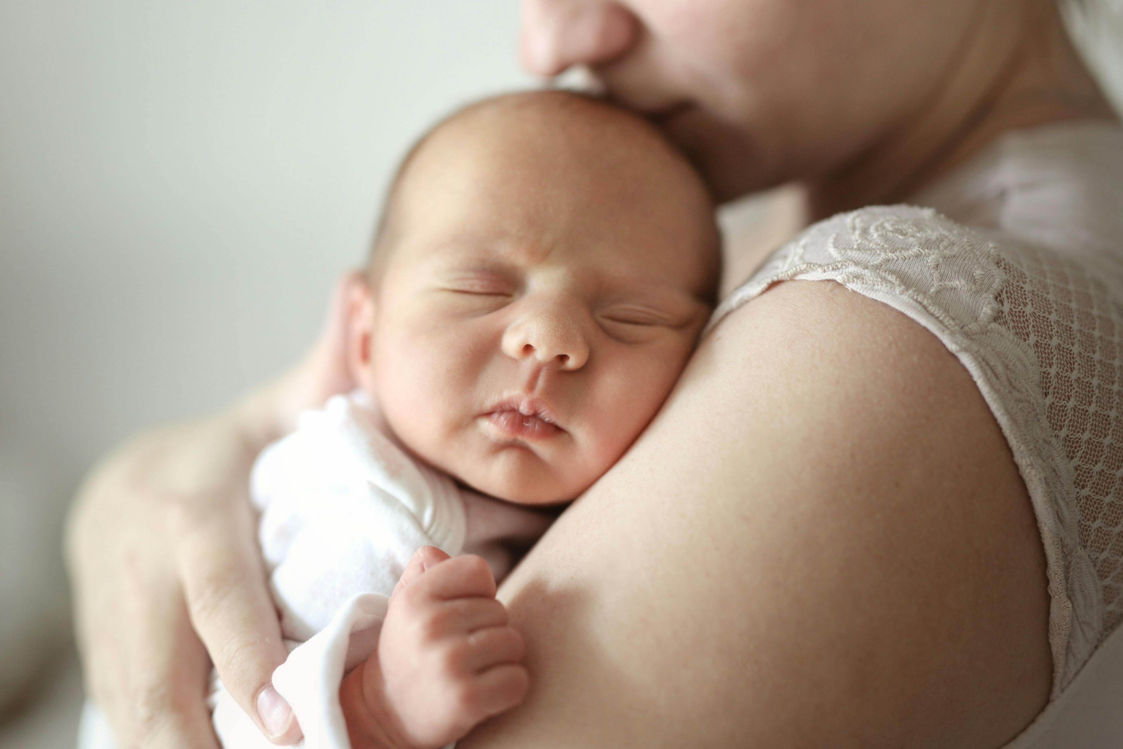 Mom and newborn baby. Light tone and soft toning | Image Credit: natalialeb - stock.adobe.com